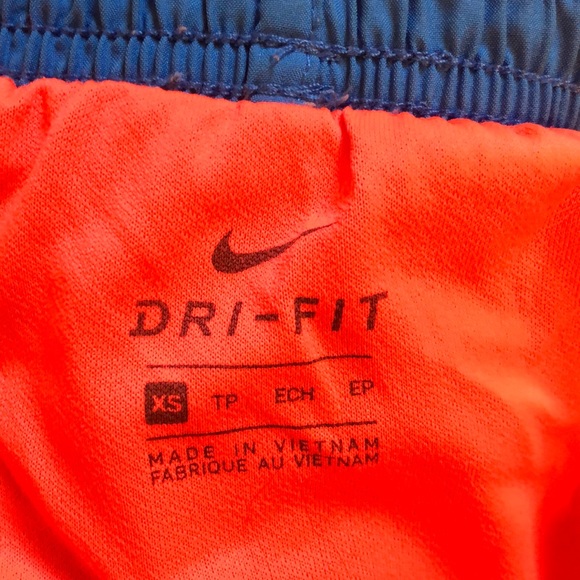 Bright blue and orange Nike shorts - Picture 2 of 2